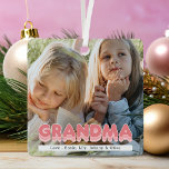 Modern Grandma 2 Photo Christmas Metal Ornament<br><div class="desc">Modern family christmas ornament featuring a picture either side for you to replace with your own,  the title "grandma" in a bold pink bubble font,  and the grandchildrens names.</div>