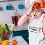 Modern Grandma's Kitchen Is Always Open Best Gift Kids Apron<br><div class="desc">Welcome to Grandma's Kitchen, where love and warmth are always on the menu! Delight your favourite grandmother with this charming gift product from Zazzle. Whether it's for Mother's Day, her birthday, or just to show appreciation, this thoughtful item is sure to bring a smile to her face.Surprise Grandma with a...</div>