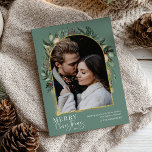 Modern Greenery Gold Arch Merry Christmas Photo Holiday Card<br><div class="desc">This design features a modern greenery arch with a delicate glitter gold frame & gold brush strokes with a single vertical photo. To make advanced changes,  please select 'Click to customise further' option under 'Personalise this template' section. Here,  you can edit/add text boxes,  colour and font.</div>