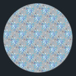 Modern grey and blue Holiday Snowflakes pattern Classic Round Sticker<br><div class="desc">Modern blue and white Holiday Snowflakes pattern on a grey backdrop. Need more? Check out other holiday designs at my store! Cheers! :)</div>