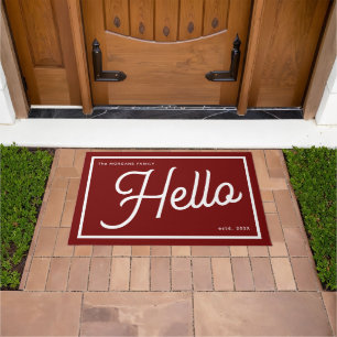 Modern Hello Burgundy White Script Family Name Doormat