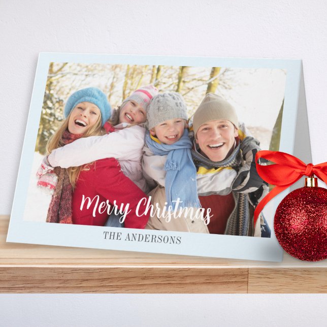Modern Ice Blue Simple Elegant Photo Christmas Holiday Card (A modern Christmas card featuring a custom family photo and name on an ice blue background)