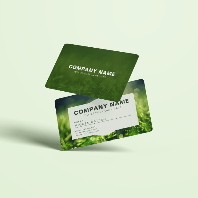 Modern Landscaping and Lawn care  Business Card (Landscaping and lawn care green grass business card. Front and back both shown in mockup.)