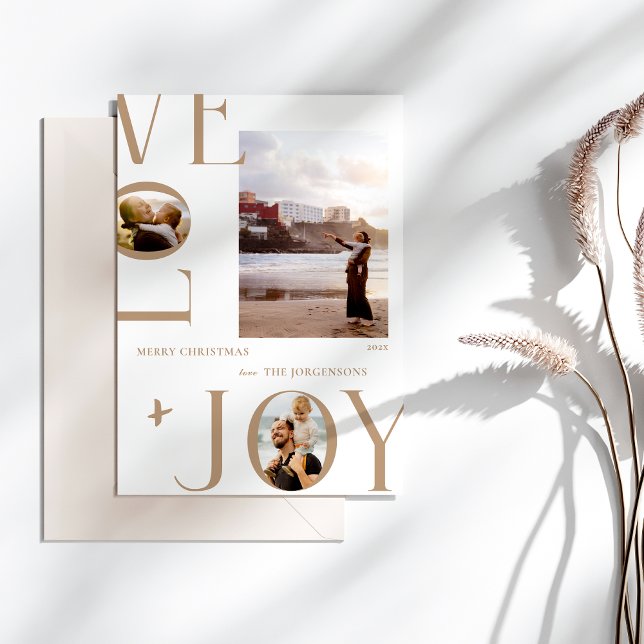 Modern Love & Joy Family Photo Christmas Card (Love and joy holiday card on white background with beige envelope and shadowed by foliage
)