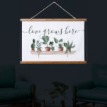 Modern love quote plants watercolor illustration hanging tapestry<br><div class="desc">A cool and modern love quote house plants watercolor illustration with different painted plants on a shelf,  cactus,  monstera,  and other succulents. A tropical and exotic touch with an editable quote saying love grows here in an elegant and modern script calligraphy.</div>