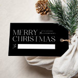 Modern Merry Christmas Black Gift Tags<br><div class="desc">Simple and modern holiday gift tags featuring "Merry Christmas" displayed in white modern lettering with a black background. Personalise the front of the simple Christmas gift tag by adding your name. The back of the gift tag features a black and white snowflake design.</div>