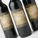 Modern Merry Christmas on Gold Black Wine Label<br><div class="desc">Elegant Merry Christmas typography in chic white lettering on a splash of faux gold foil,  these wine bottle labels feature a black background with modern gold squiggles and dots pattern. Personalised with your name. MATCHING paper plates,  napkins and MORE designs in our store.</div>