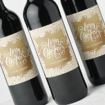 Modern Merry Christmas on Gold Wine Label<br><div class="desc">Elegant Merry Christmas typography in chic white lettering on a splash of faux gold foil,  these wine bottle labels feature a background of modern gold squiggles and dots pattern. Personalised with your name. MATCHING paper plates,  napkins and MORE designs in our store.</div>