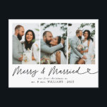 Modern Merry & Married Wedding Photo Christmas  Holiday Postcard<br><div class="desc">Send festive holiday greetings with our Modern Merry & Married Wedding Photo Christmas Holiday Postcard! Featuring a cherished wedding photo alongside the joyful Merry & Married message in sleek, modern typography, this postcard beautifully captures the warmth of your first holiday season as newlyweds. The clean, elegant design allows your photo...</div>