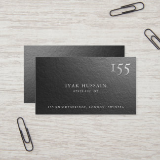Modern Minimal Black and Silver Foil Embossed Logo Business Card