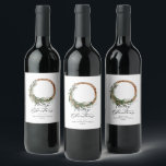 Modern minimal foliage wreath peace script holiday wine label<br><div class="desc">Modern minimal foliage wreath peace script holiday Christmas design. Hand painted eucalyptus,  minimal foliage and modern rustic rattan wreath give this holiday card a luxurious feel. In classy greens,  browns and greys.</div>
