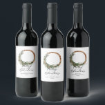 Modern minimal foliage wreath peace script holiday wine label<br><div class="desc">Modern minimal foliage wreath peace script holiday Christmas design. Hand painted eucalyptus,  minimal foliage and modern rustic rattan wreath give this holiday card a luxurious feel. In classy greens,  browns and greys.</div>