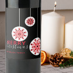 Modern Minimal Nordic Black Red White Christmas Wine Label<br><div class="desc">Enhance the sophistication of your festive gatherings by incorporating this personalised Christmas wine label. The label is adorned with three charming red and white snowflakes, suspended like delicate ornaments against a sophisticated black backdrop. The festive greeting "Merry Christmas" is beautifully scripted in a modern font, inviting warmth and cheer. Below...</div>