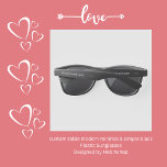 modern minimal & simple black Plastic Sunglasses<br><div class="desc">Elevate your style with our Modern Minimal & Simple Black Plastic Sunglasses, perfect for all occasions. Customise with your name and date, adding a touch of elegance to your look. Whether it's for a wedding or any special event, these sunglasses from HobiniShop blend minimalism with modern flair. Stay stylish and...</div>