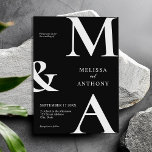 Modern Minimalist Black and White Wedding Invitation<br><div class="desc">Modern Minimalist Black and White Wedding Invitation. Features bold monogram typography and minimal graphic design. Personalise text with all the details of your special day.</div>