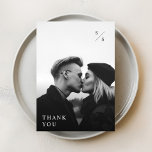 Modern Minimalist Black Typography Photo Wedding Thank You Card<br><div class="desc">Express your gratitude with our Modern Minimalist Black Typography Photo Wedding Thank You Card. This minimal black and white wedding photo thank you card showcases a beautiful couple’s photo and a minimalist design,  perfect for modern,  trendy outdoor or destination weddings. Ideal for winter,  fall,  or autumn weddings.</div>