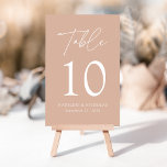 Modern Minimalist Blush Wedding Table Number<br><div class="desc">Elegant wedding table number card displaying the word "Table" in a white handwritten script with the table number, your names, and wedding date shown below with a blush background. The design repeats on the back. To order the table number cards, simply type each number and add it to your cart....</div>