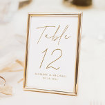 Modern Minimalist Gold Script Wedding Table Number<br><div class="desc">Simple, modern wedding table number cards featuring "Table" displayed in a handwritten gold script with a white background (or a colour of your choosing). To order the gold wedding table cards: add your name, wedding date, and table number. Each number needs to be added to your cart individually. After you...</div>