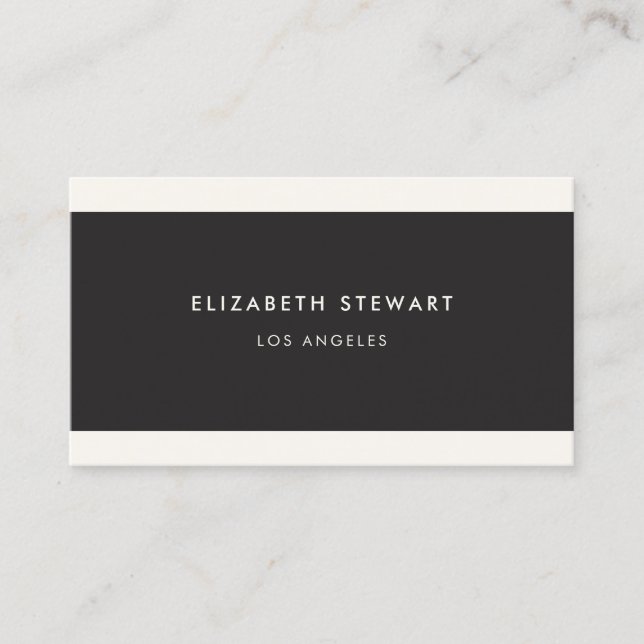 Modern Minimalist Professional Black and Ivory Business Card (Front)