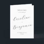 Modern Minimalist Script Black White Wedding Fold Programme<br><div class="desc">Welcome guests to your wedding day with this beautifully designed folded program that combines simplicity and sophistication. The elegant cover features customisable names and event details in graceful typography, while the inside includes a preformatted template to outline your ceremony and wedding party details. The back is thoughtfully designed with a...</div>