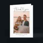 Modern Minimalist Script Heart Wedding Photo Thank You Card<br><div class="desc">Elegant and simple wedding thank you folded greeting card featuring a hand lettered typography script text with a heart between the words. This casual script and the white space gives a simple and minimalistic feel. Customise this product by inserting your own vertical wedding photos and editing the message inside the...</div>