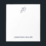 Modern Minimalist Script Monogram White Notepad<br><div class="desc">Keep all of your notes organised with this modern minimalist script monogram notepad. Featuring a sleek and simple design,  this notepad is perfect for use at home,  in the office,  or on-the-go. The white background and customisable navy blue script monogram make this notepad a stylish addition to any workspace.</div>
