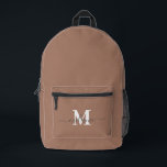 Modern Mocha Mousse Custom Monogram Name Printed Backpack<br><div class="desc">Elevate your everyday style with this Modern Mocha Mousse Custom Monogram Name Printed Backpack. Designed in Mocha Mousse, the colour of the year, this backpack blends sophisticated minimalism with personalised elegance. The sleek, neutral tone makes it versatile and timeless, while the option to add your custom monogram or name adds...</div>