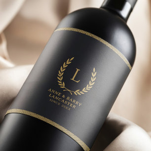 Modern Monogram Black & Gold Family Name Wedding Wine Label