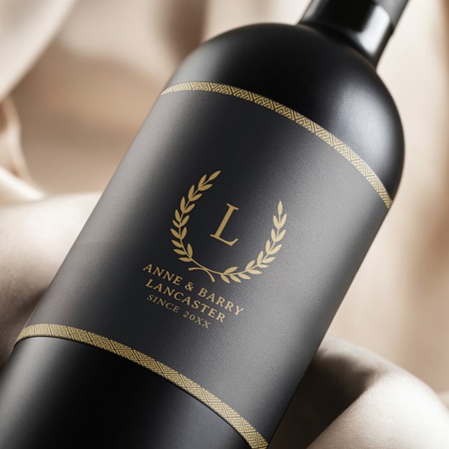 Modern Monogram Black & Gold Family Name Wedding Wine Label (Creator Uploaded)