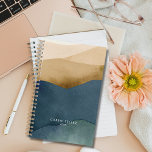 Modern Mountains | Watercolor Paper Landscape Planner<br><div class="desc">Stay organised and inspired with our customisable planner featuring a modern mountains design with subtle watercolor paper-layered on both the front and back covers. Personalise it with your name and the year for a planner that's uniquely yours. With ample space for scheduling, note-taking, and goal-setting, this planner is subtlety elegant...</div>