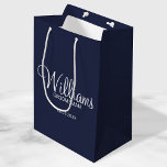 Modern Navy Blue  Personalised Groomsman Medium Gift Bag<br><div class="desc">Personalised Groomsman Gifts
featuring personalised groomsman's name in white modern script font style with title and wedding date in modern sans serif font style on navy blue background.

Also perfect for best man,  father of the bride,  bridesmaid,  maid of honour,  mother of the bride and more.</div>