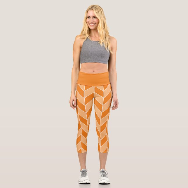 Modern Orange Peach Herringbone Chevron Pattern Capri Leggings (Front)