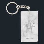Modern Personalised Bridesmaid's Monogram and Name Key Ring<br><div class="desc">Modern Personalised Bridesmaid's Monogram and Name Gifts This design features personalised bridesmaid's name in grey modern handwriting script font style and monogram in light grey modern sans serif font style as background, with wedding details in grey modern sans serif font style, on white marble background. Also perfect for maid of...</div>
