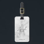 Modern Personalised Bridesmaid's Monogram and Name Luggage Tag<br><div class="desc">Modern Personalised Bridesmaid's Monogram and Name Gifts This design features personalised bridesmaid's name in grey modern handwriting script font style and monogram in light grey modern sans serif font style as background, with wedding details in grey modern sans serif font style, on white marble background. Also perfect for maid of...</div>