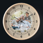 Modern Photo Grandpa Script Heart Clock<br><div class="desc">Modern Photo Grandpa Script Heart Wall Clock features your favourite photo with the text "We (heart) you Grandpa" in a modern white typography overlay. Personalise by editing the text in the text box provided. Designed by ©Evco Studio www.zazzle.com/store/evcostudio</div>