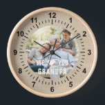 Modern Photo Grandpa Script Heart Clock<br><div class="desc">Modern Photo Grandpa Script Heart Wall Clock features your favourite photo with the text "We (heart) you Grandpa" in a modern white typography overlay. Personalise by editing the text in the text box provided. Designed by ©Evco Studio www.zazzle.com/store/evcostudio</div>