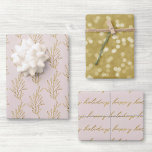 Modern Pink and Gold Calligraphy Christmas Wrapping Paper Sheet<br><div class="desc">Custom-designed wrapping paper sheets featuring "Happy Holidays" modern gold hand calligraphy with gold bokeh and foliage design.</div>