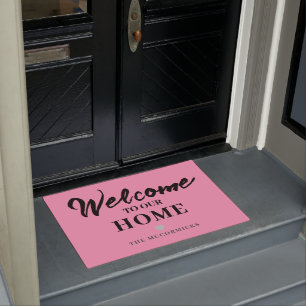 Modern Pink Black Welcome Script Family Name Doormat