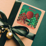 Modern Red and Green Sparkling Christmas Trees  Square Sticker<br><div class="desc">Add a touch of personal charm to your holiday gifts with this customisable Christmas sticker. It features a vibrant green background adorned with modern, geometric trees in festive red and green hues. The trees are beautifully highlighted with sparkling lights, creating a warm and joyful atmosphere. The sticker also includes a...</div>
