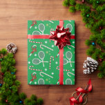 Modern Red Candy Cane Tennis Theme Christmas Green Wrapping Paper<br><div class="desc">Always merry,  Xmas candy canes tennis theme pattern design with red bows and red peppermint Christmas candies,  together with retro tennis rackets and balls. Cute,  whimsical candy cane tennis player,  tennis coach,  tennis lover,  tennis team design wrapping paper. Tennis Christmas Xmas theme decor and gifts.</div>