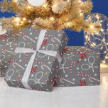 Modern Red Candy Cane Tennis Theme Christmas Grey Wrapping Paper<br><div class="desc">Always merry,  Xmas candy canes tennis theme pattern design with red bows and red peppermint Christmas candies,  together with retro tennis rackets and balls. Cute,  whimsical candy cane tennis player,  tennis coach,  tennis lover,  tennis team design wrapping paper. Tennis Christmas Xmas theme decor and gifts.</div>