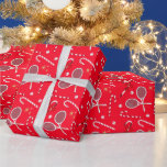 Modern Red Candy Cane Tennis Theme Christmas  Wrapping Paper<br><div class="desc">Always merry,  Xmas candy canes tennis theme pattern design with red bows and red peppermint Christmas candies,  together with retro tennis rackets and balls. Cute,  whimsical candy cane tennis player,  tennis coach,  tennis lover,  tennis team design wrapping paper. Tennis Christmas Xmas theme decor and gifts.</div>