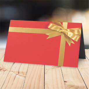 Modern Red Gift with Golden Bow   Holiday Place Card