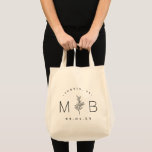 Modern Rustic Floral Stem Wedding Monogram Tote Bag<br><div class="desc">Custom printed tote bags make a fun and functional wedding favour your guests will love! Personalise the template with the bride and groom's names or monogram initials. Add your wedding date, the city, state or venue name or any other custom text. This modern rustic logo-style design has a simple floral...</div>