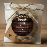 Modern Rustic Wedding Dinner Thank You Gifts  Classic Round Sticker<br><div class="desc">Modern Wedding rustic Thank You Gifts Classic favour Round Sticker,  in clean script,  little cute red heart,  with bride and groom signature and wedding date,  cottage brown wood,  string lights theme.</div>