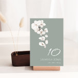 Modern Sage Green and White Orchids Wedding Table Number<br><div class="desc">Modern Sage Green and White Orchids Flowers Wedding Table Numbers - Elegant Monochrome Botanical Design. Elevate your wedding celebration with our modern sage green and white table numbers featuring the timeless allure of white orchids. The minimalist design captures the elegance of these blooms, creating a sophisticated botanical masterpiece. With the...</div>