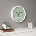 Modern Sage Green Personalised Monogram and Name  Clock<br><div class="desc">The Modern Sage Green Personalised Monogram and Name Clock features a sophisticated sage green background with custom monogramming and name details. This elegant timepiece combines functionality with a personalised touch, making it a stylish addition to any home or office. The sleek design ensures it complements modern decor while showcasing a...</div>