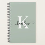 Modern Sage Green Script Monogram Planner<br><div class="desc">This simple, elegant sage green 5.5 x 8.5 soft planner with your first name in a trendy script font in black and your first initial in a modern cap font in white is perfect for your keys. It's stylish and trendy and yet very classic. It will make keeping appointments, meetings,...</div>