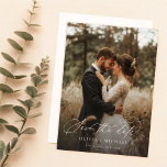 Modern Script Elegant Wedding Photo Save The Date<br><div class="desc">Capture the essence of your love story with our Modern Script Elegant Wedding Photo Save The Date. This card features two stunning full-bleed photos, showcasing your romantic moments in a rustic landscape setting. The elegant handwritten calligraphy script adds a touch of sophistication, while the modern layout ensures a stylish and...</div>