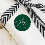 Modern Script Green Christmas Joy Classic Round Sticker<br><div class="desc">This is a simple but elegant holiday sticker using a beautiful script font in classic green and white with the word "Joy". This is would suit anyone looking for gift wrapping supplies that are both modern, minimal in style and festive. Please contact the designer for any queries regarding this design...</div>